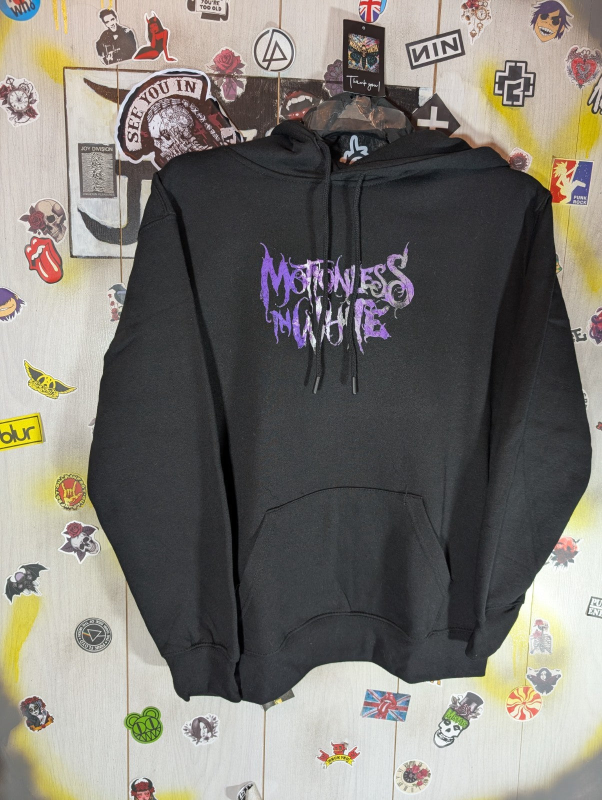 Motionless in white hoodie