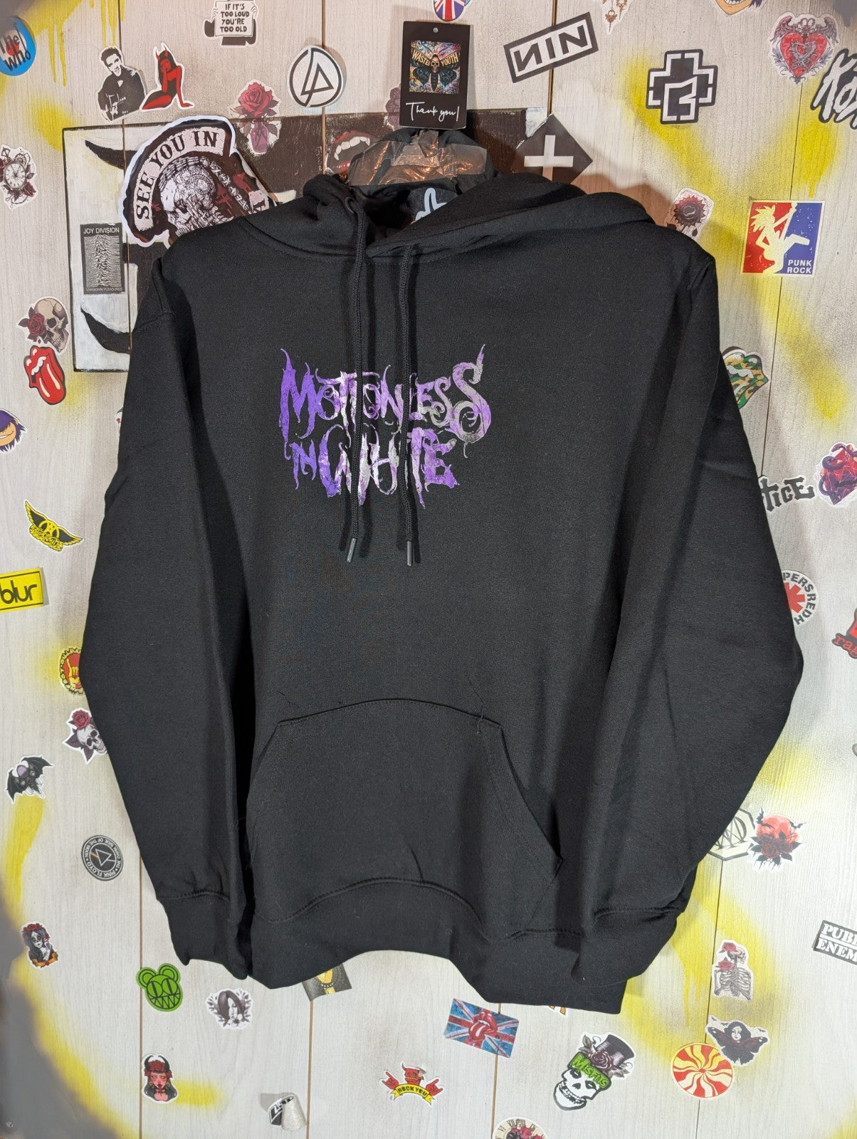 Motionless in white hoodie